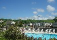 The outdoor pool and sun patio at Cenarth Falls Holiday Park
